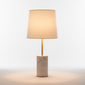 Luminária de mesa com base em mármore e cúpula em tecido branco